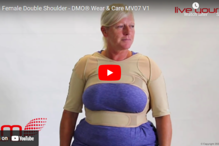 youtube thumbnail of a lady standing in a purple top wearing a female double shoulder orthosis