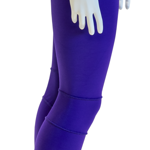 made-to-measure sensory leggings on a mannequin in a purple colour with an open crotch. Side on view